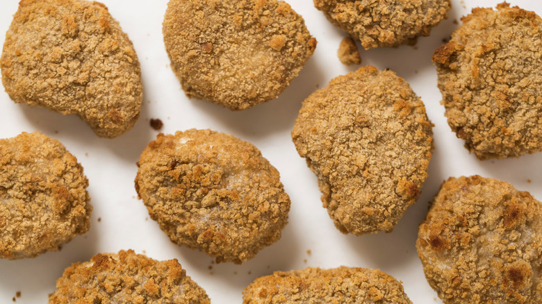 Chicken nuggets on white background
