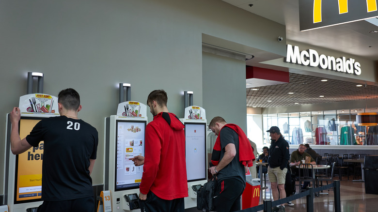 ordering at a McDonald's kiosk