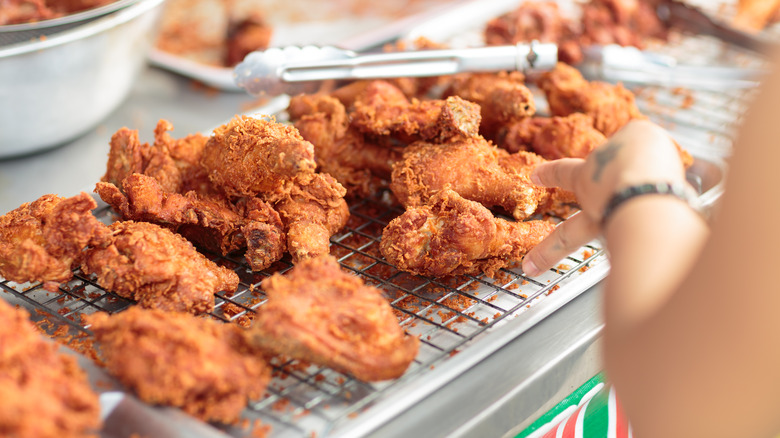 Fried chicken for sale on a cart