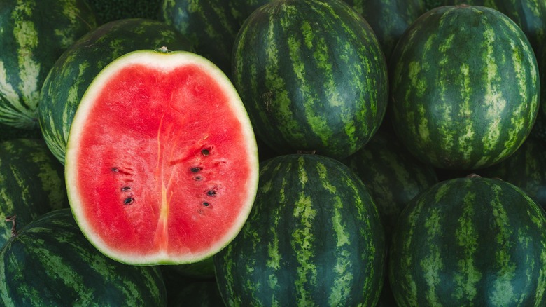 Half a watermelon in pile