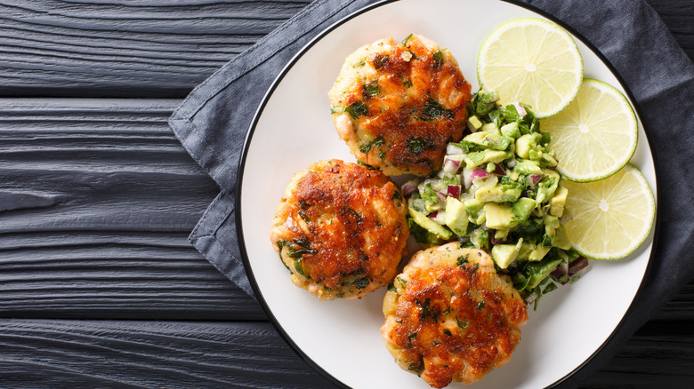 Salmon patties with avocado salad