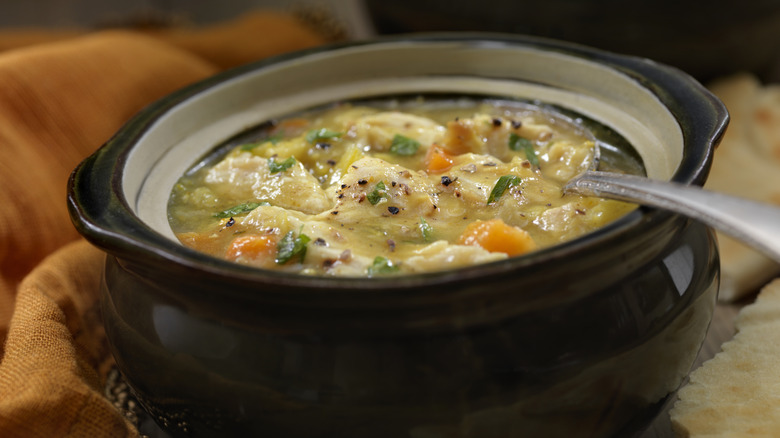 Soup in a black bowl