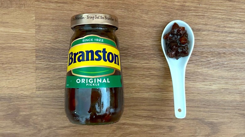 Jar and spoonful of Branston pickle