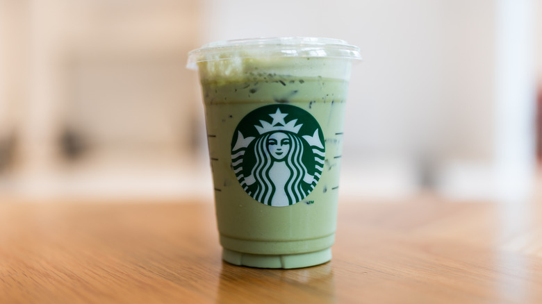 Starbucks cup of matcha on a table/countertop