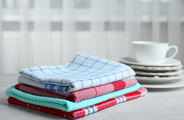 Wash used kitchen towels 