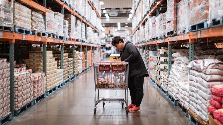 Costco shopper with grocery cart