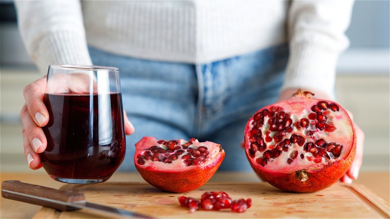 pomegranate half and pomegranate juice