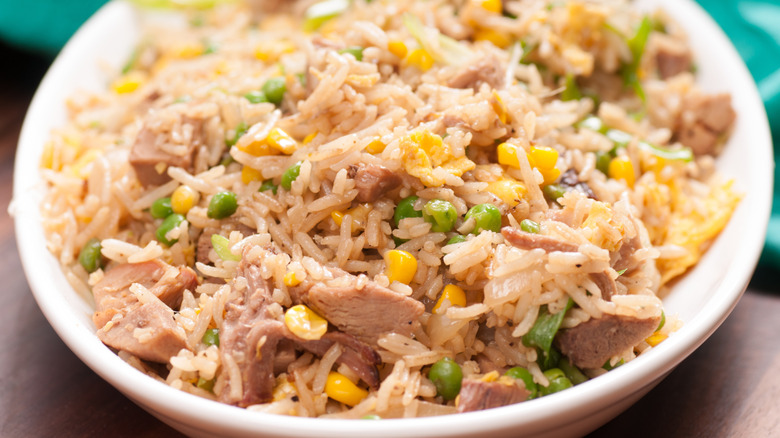 Pork fried rice in white bowl