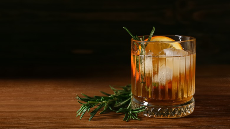 Old Fashioned cocktail on wood table 