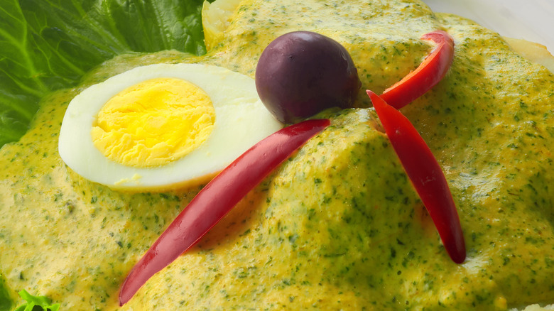 Peruvian dish with huacatay sauce