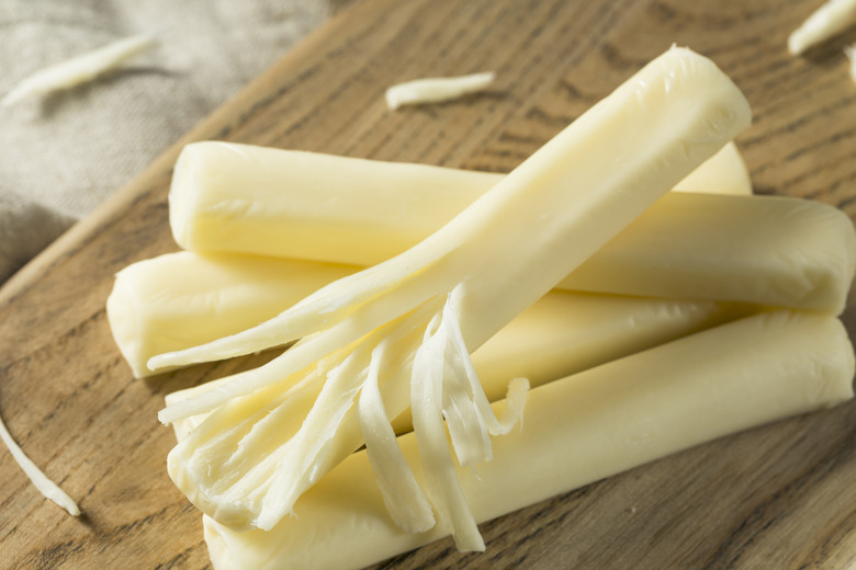 Biting string cheese