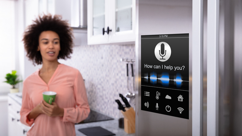 Woman with smart fridge