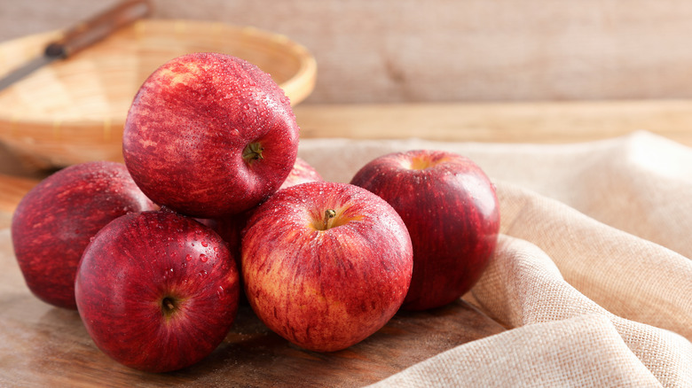 Gala apples on a wooden board