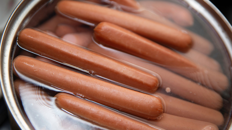Hot dogs in a pot of water