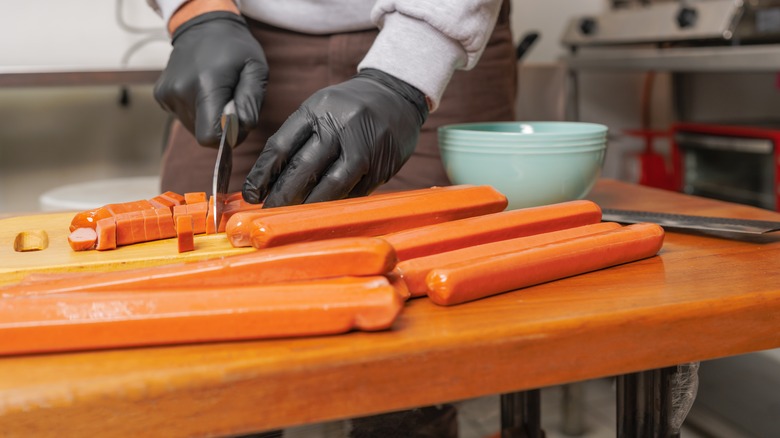 Hot dogs on a cutting board