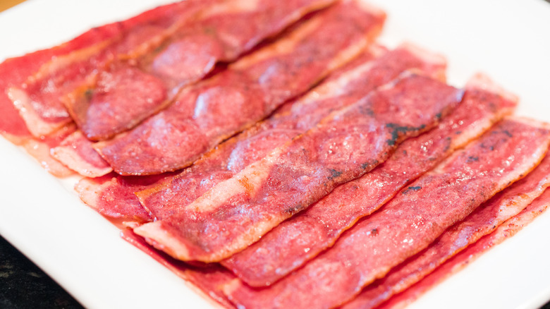 cooked slices of turkey bacon