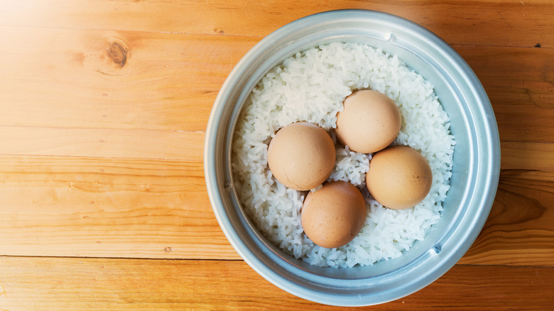 Eggs and rice in pot