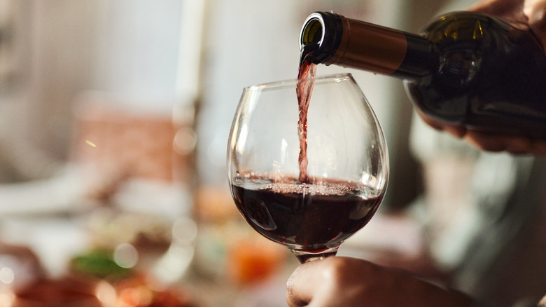 pouring red wine
