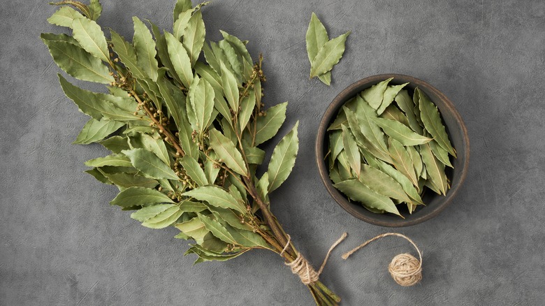 Laurel leaves strung together and in bowl