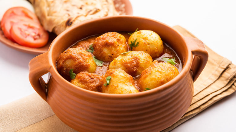 dum aloo curry made with fried onion paste