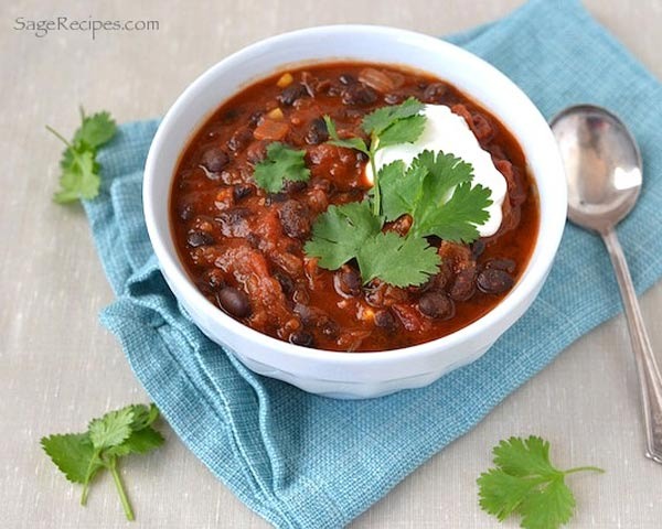 For an easy way to spice up traditional tomato soup, add some warm Indian spices and hearty black beans.
