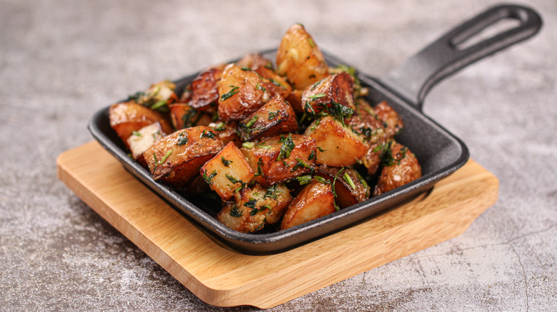 chili lime roasted potatoes in skillet