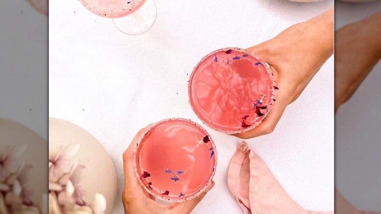 light pink cocktails with flowers