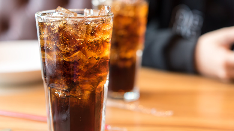 Cola in glass with ice