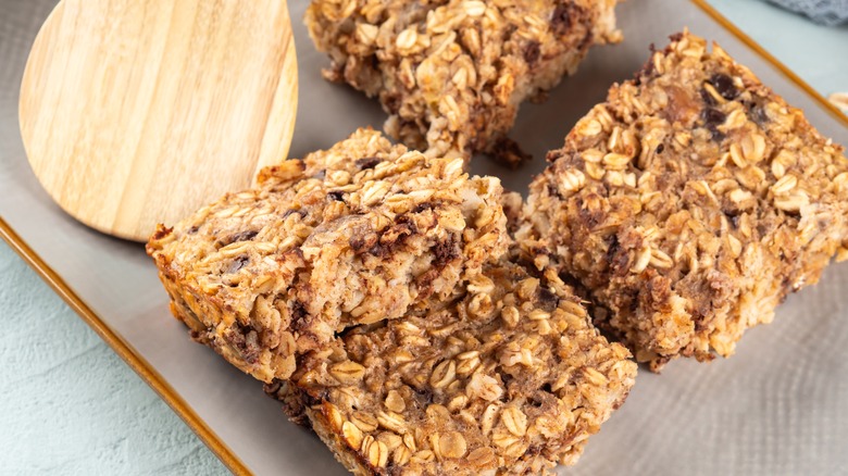 Oatmeal, peanut butter, and banana breakfast bars on a plate