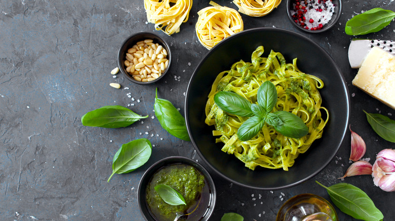 A bowl of pasta tagliatelle with pesto.