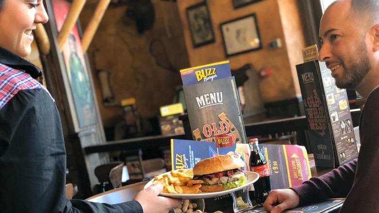 waiter serving food at old wild west