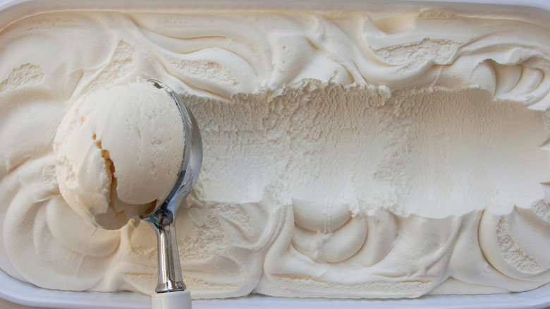 A carton of white ice cream