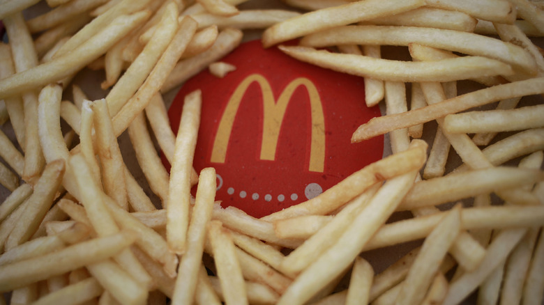 McDonald's fries covering a fry container