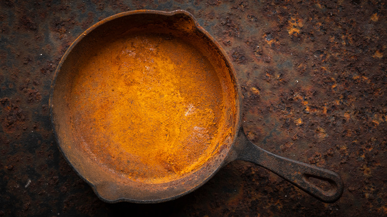 Rusty cast iron skillet