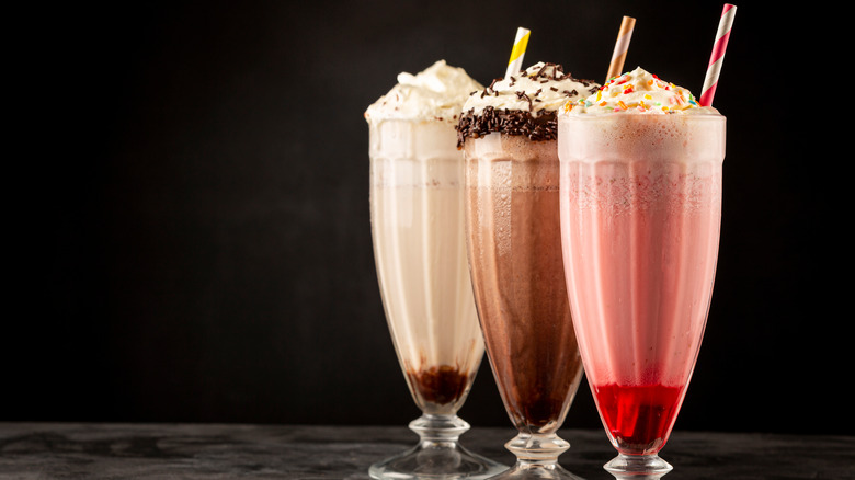 Vanilla, chocolate,  and strawberry milkshakes
