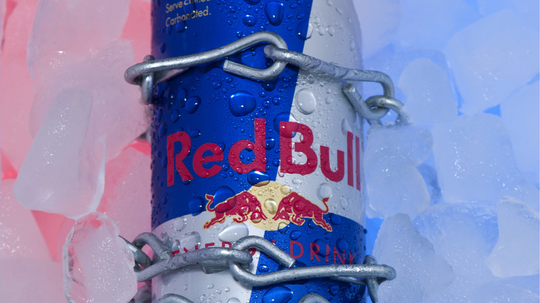 Can of Red Bull in chains