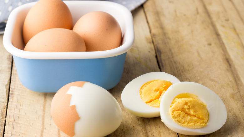 hard boiled eggs on a table and in a dish