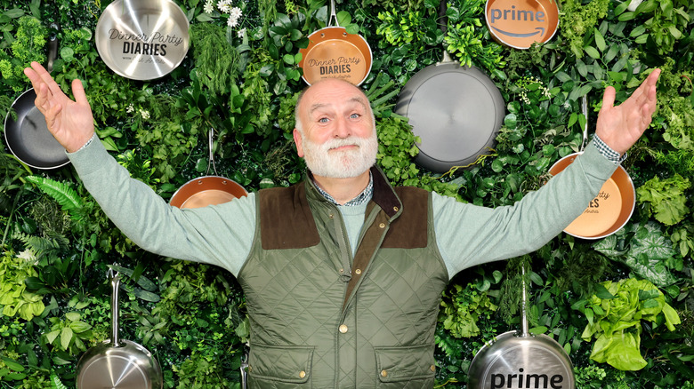 José Andrés arms raised smiling
