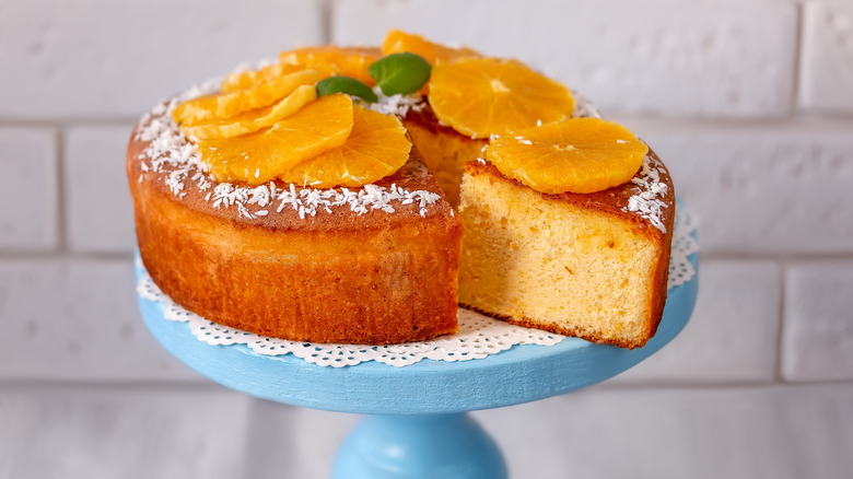 Sliced cake with fruit topping