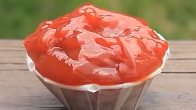Expanded ketchup cup