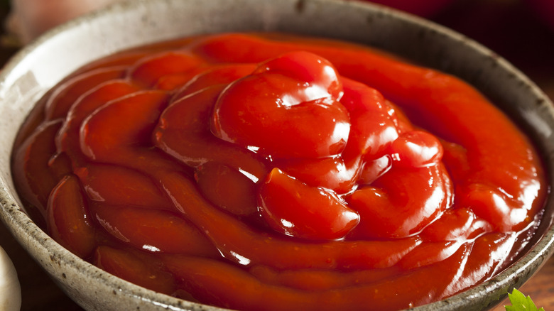 Gray bowl of ketchup