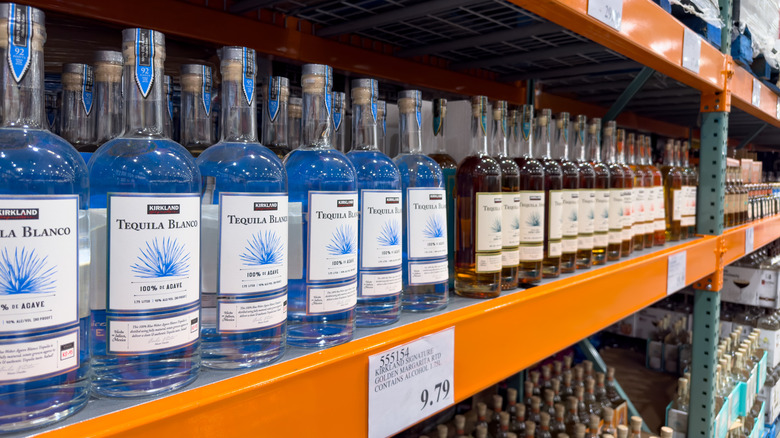 Kirkland Signature tequila bottles lined up on store shelf
