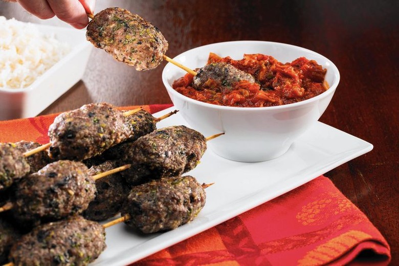 Lamb and Kalamata Sausages With Minted Tomato Sauce recipe - The Daily Meal