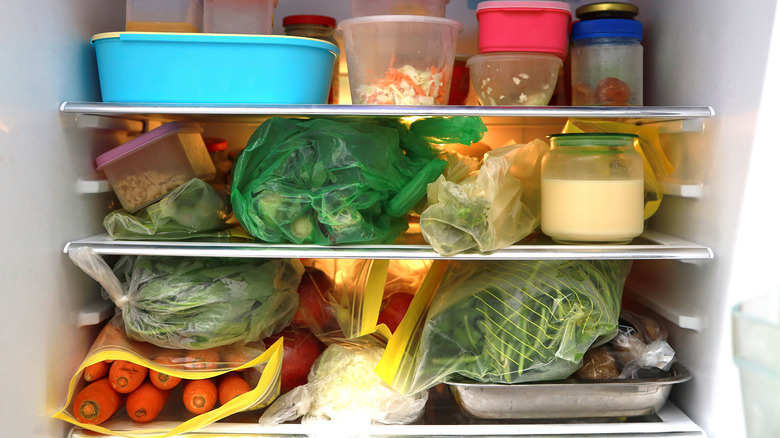 open fridge filled with various food