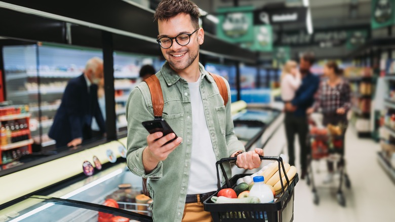 man smartphone shopping