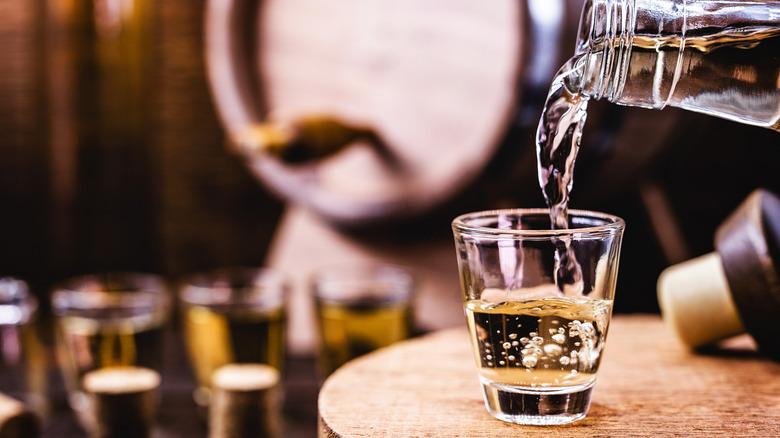 pouring golden rum