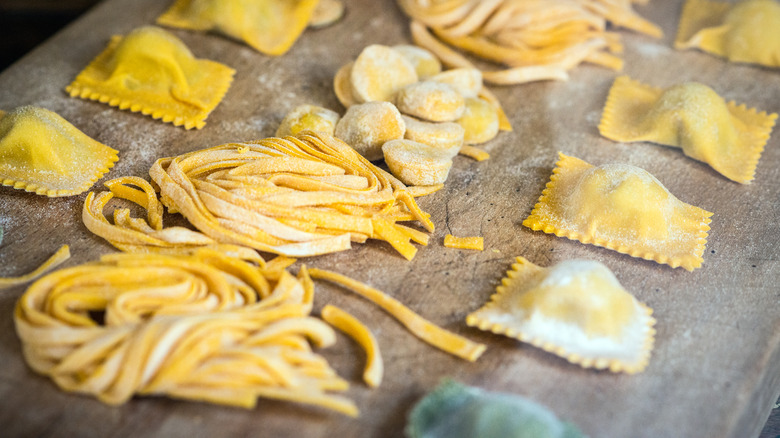 Fresh pasta on wooden board