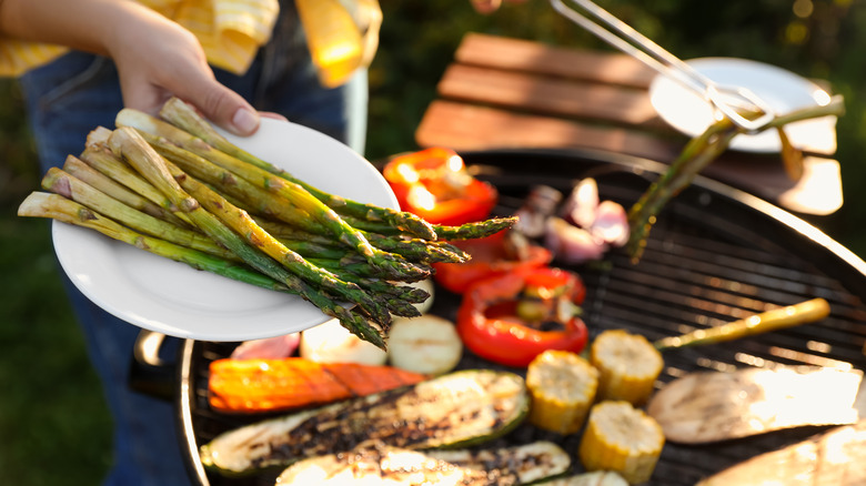 A variety of vegetables being grilled