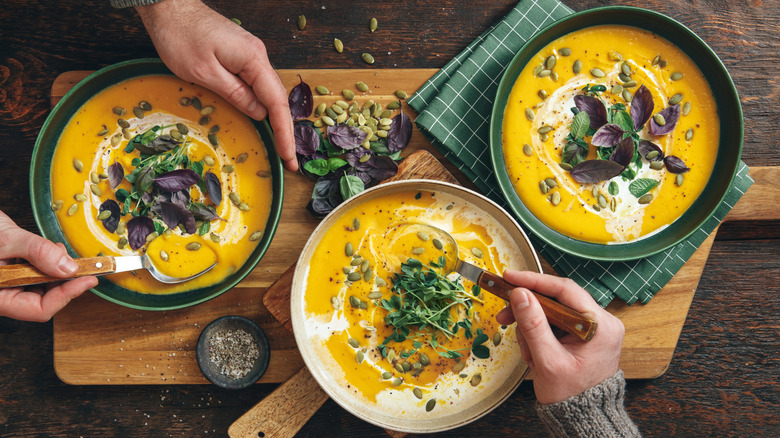 Three bowls of soup