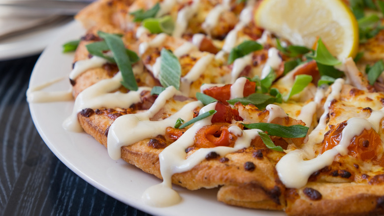 pizza with mayonnaise topping